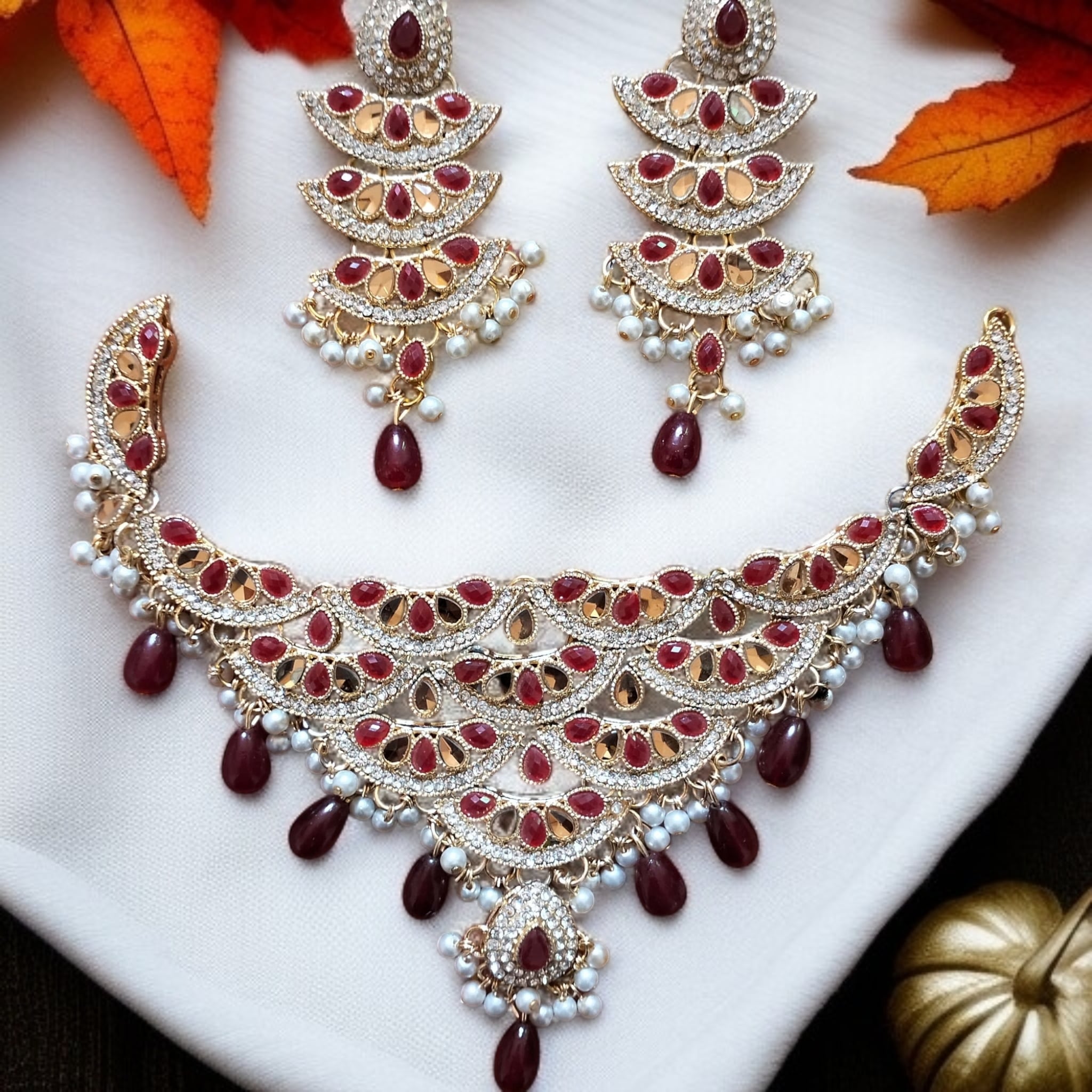 Buy Red and Golden colour jewellery set with necklace and earrings at best price in Pakistan