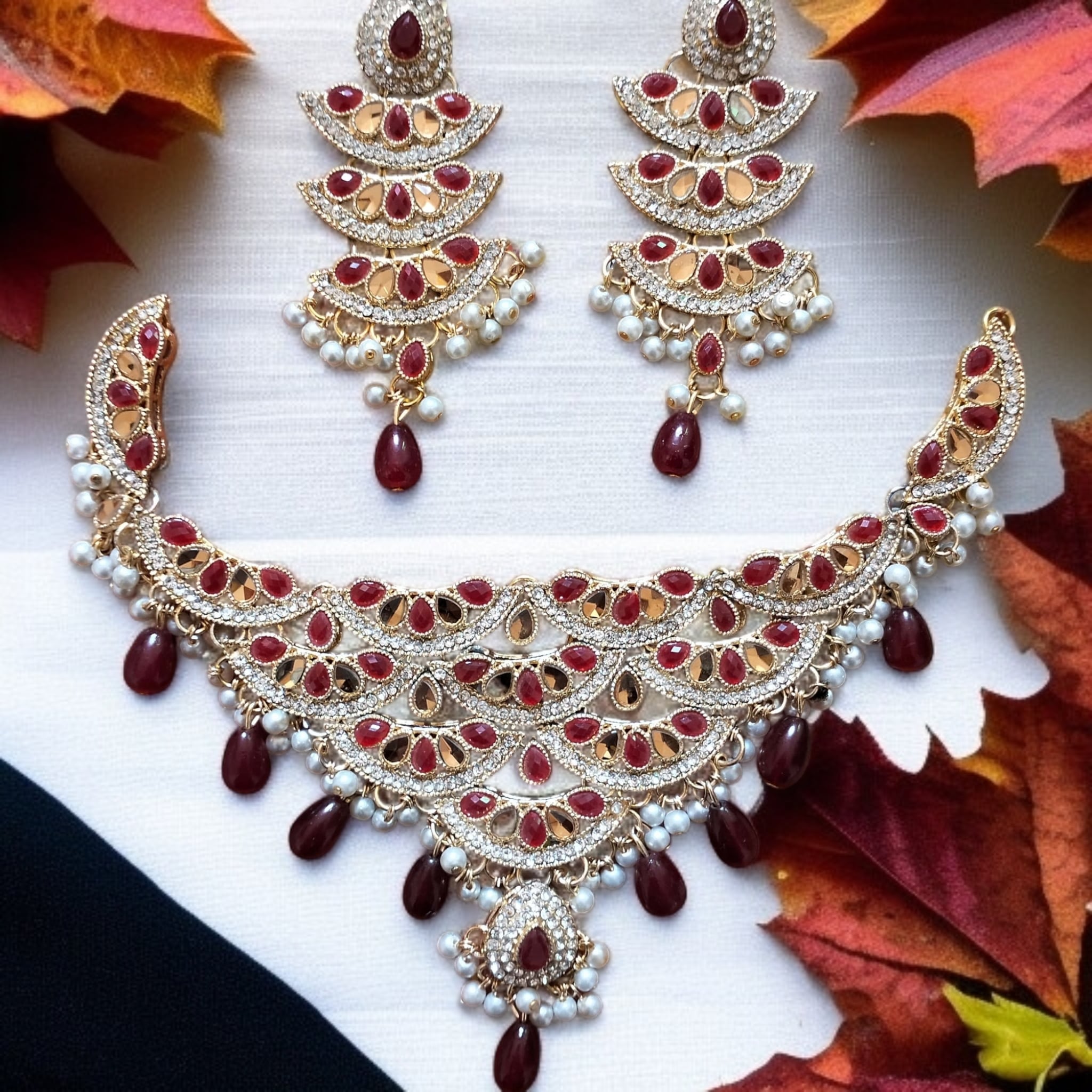 Buy Red and Golden colour jewellery set with necklace and earrings at best price in Pakistan
