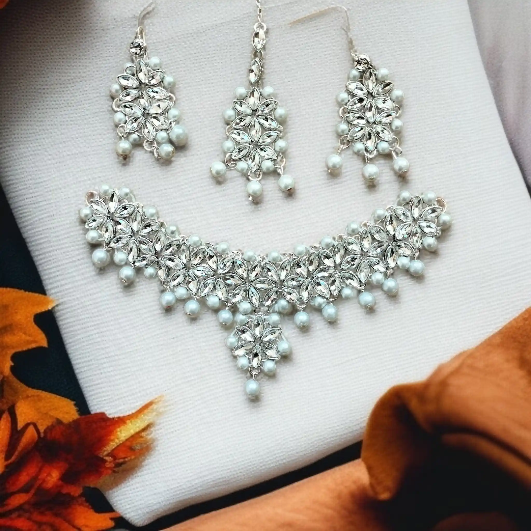 Buy Multi colour jewellery set with necklace , earrings and tikka at best price in Pakistan