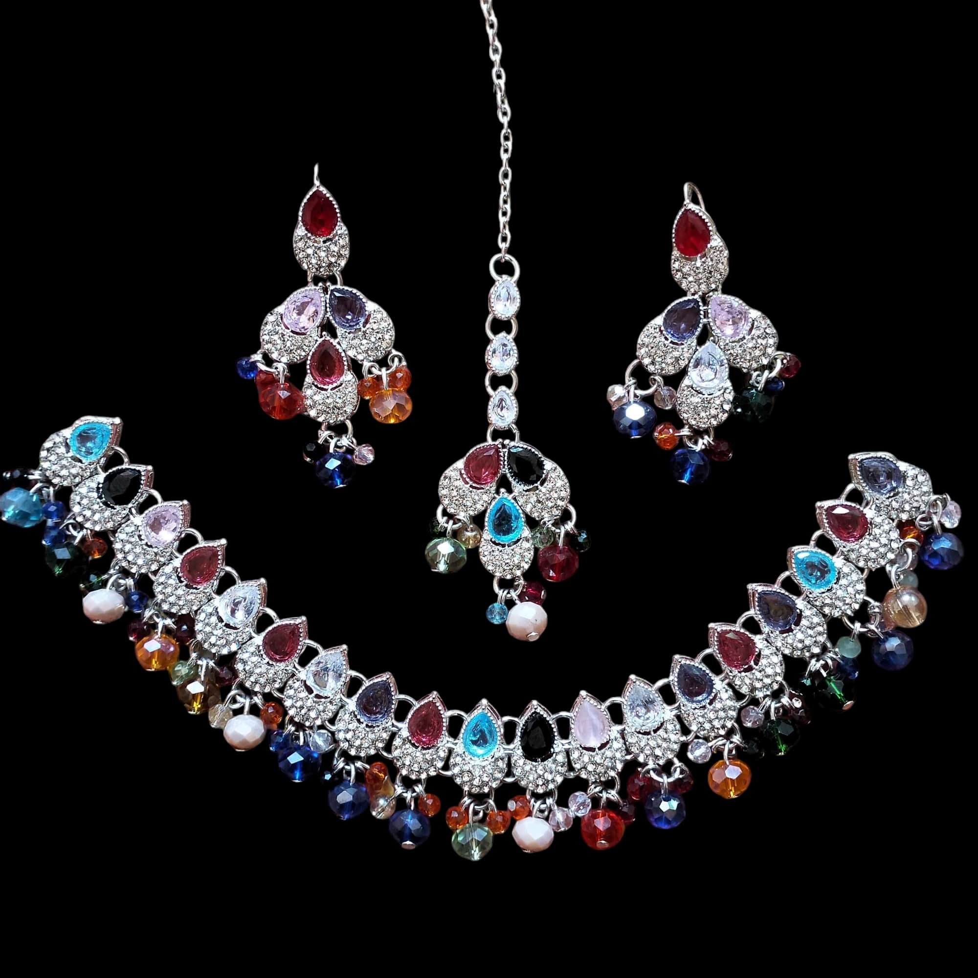 Buy multi colour jewellery set with necklace , earrings and tikka at best price in Pakistan