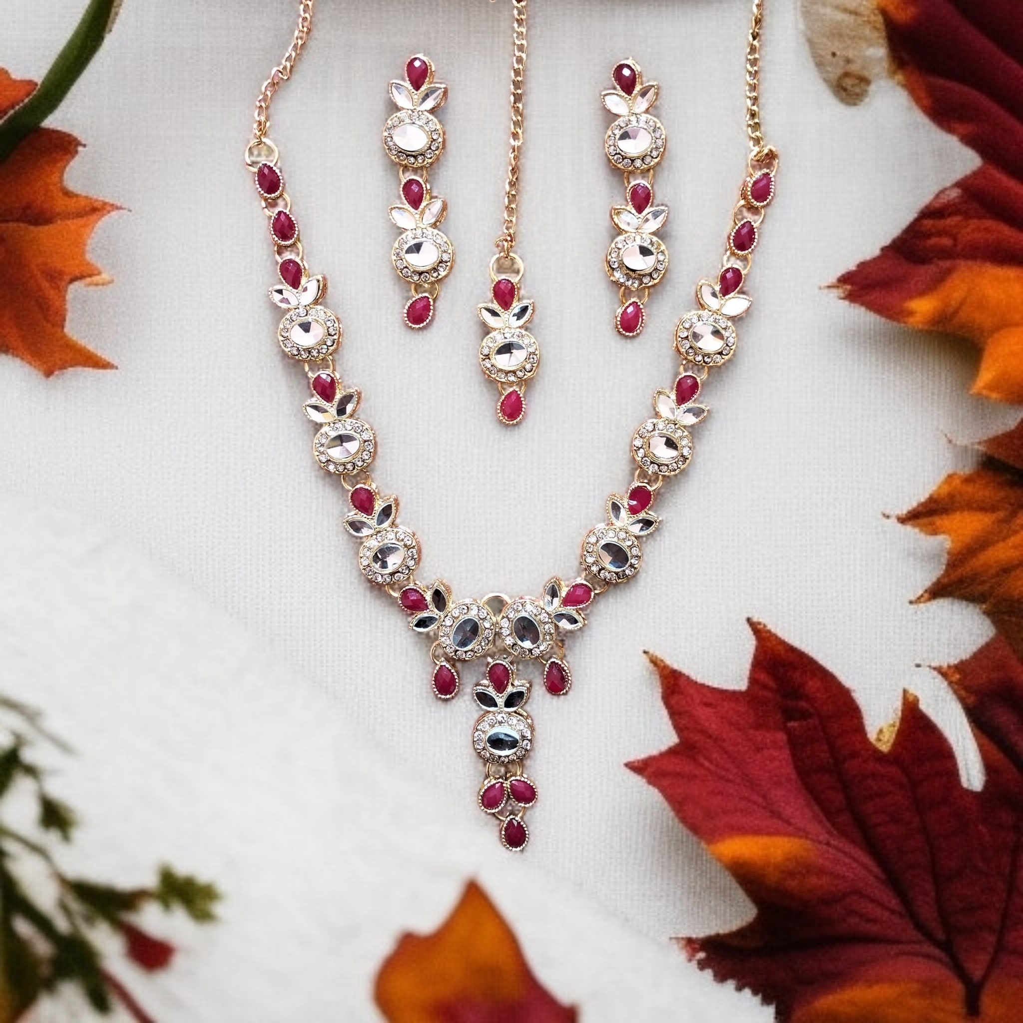 Buy Red and Golden colour jewellery set with necklace , earrings and tikka at best price in Pakistan